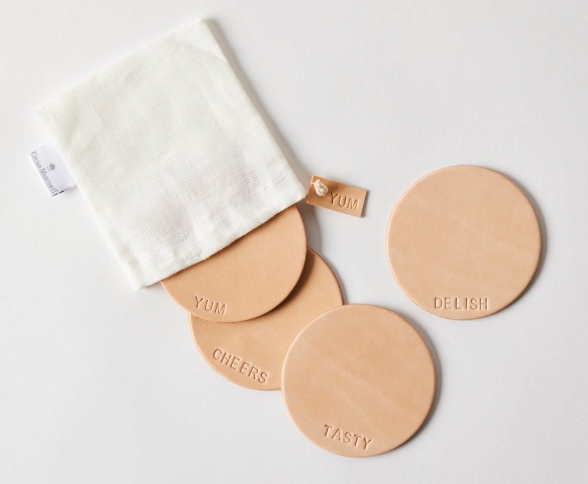 Leather Coasters- Delish - celina mancurti - coasters - -hand-pressed lettering